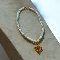 Amoré Pearl Pendant. timeless elegance. Plated with 24k